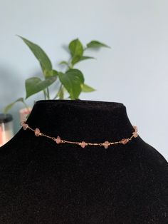 **PLEASE PLACE HOLIDAY ORDERS BEFORE DEC 14 7PM EST!! SHOP BREAK: ORDERS MADE AFTER DEC 15 WILL NOT BE DISPATCHED UNTIL JAN 2 ** THANK YOU ♥ a stunning crystal choker made of amethyst crystals or rose quartz crystals adorned with a gold-plated chain and gold findings  each choker will come with a 2 inch extension chain this choker is a delicate and dainty piece that looks absolutely beautiful in the sunlight.  each stone has a slightly different color and an irregular shape, lending to its imper Gold Crystal Choker Necklaces For Festival, Gold Crystal Choker For Festivals, Gold Crystal Choker Necklace For Festival, Crystal Choker Necklace With Delicate Chain For Gifts, Gold Spiritual Crystal Choker Necklace, Delicate Chain Crystal Choker Necklace For Gift, Adjustable Gold Rose Quartz Crystal Necklace, Delicate Adjustable Crystal Choker, Delicate Adjustable Crystal Choker Necklace