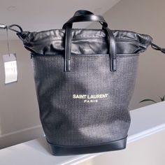 Saint Laurent 3piece Bag (Brand New)Also Comes With Duster Bag!!!Great Deal Designer Bucket Bag With Dust Bag For Errands, High-end Tote Bucket Bag For Travel, High-end Bucket Bag Tote For Travel, High-end Bucket Tote Bag For Travel, Designer Bucket Bag With Leather Handles For Travel, Designer Bucket Bag For Travel, Designer Double Handle Bucket Bag For Travel, Designer Travel Bucket Bag, Designer Coated Canvas Bucket Bag For Shopping