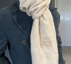 This personalised embroidered scarf is the perfect gift idea for anniversaries or Christmas. It features yours and your soulmate's initials, as well as your anniversary date in roman numerals. With its elegant design and thoughtful personalisation, this scarf is a unique and meaningful present that will be cherished for years to come. Celebrate your loving relationship with your soulmate for their anniversary, birthday, Christmas, or perhaps you would like your childs initials and birthday embroidered, whatever the occasion, our embroidered scarves are the perfect gift for all this winter. Main image shows Almond scarf with beige thread. If you would like a different design not available in our shop, dont hesitate to give us  a message so we can help create a custom order for you. Embroidered Scarves, Loving Relationship, Great Anniversary Gifts, Embroidered Scarf, Bf Gf, Anniversary Dates, Couple Gift, Scarf Gift, Personalized Embroidered