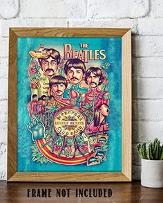 the beatles poster on a shelf next to a potted plant