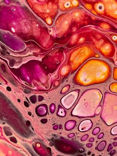 an abstract painting with lots of different colors and patterns on it's surface, as well as bubbles in the water