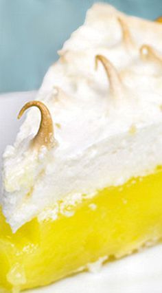 a slice of lemon meringue pie on a plate