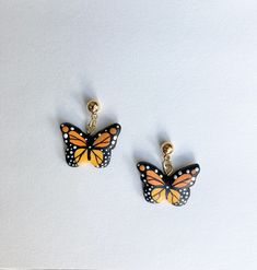 "These lovely Monarch Butterfly earrings are completely handmade from clay and intricately painted by hand. In this design I've used 14 karat gold ear posts which I love as they are comfortable and secure so that you will never lose an earring. As an artist, I am passionate about creating tiny pieces of wearable art. In my paintings I enjoy using the beauty of nature as my inspiration. These eye-catching earrings are incredibly lightweight and water resistant. I know you will absolutely love wea Butterfly Poems, I Am Passionate, Preschool Art Activities, Butterfly Cards, Preschool Art, Monarch Butterfly, Butterfly Earrings, Art Activities, An Artist