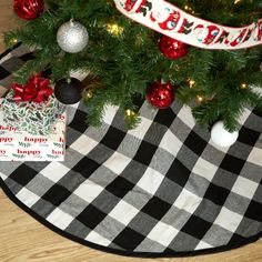 a black and white checkered christmas tree skirt