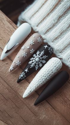 Embrace the beauty of winter with this stunning nail design! Featuring a combination of stiletto shapes, matte black accents, and delicate white snowflakes, these nails are perfect for the season. The textured white nail adds a cozy knitted effect, making this look both stylish and festive. Get inspired to recreate this elegant winter manicure for your next outing!
#nailsart #nailsart #nailsinspo #acrylicnails #nailsdesign #winternails #decembernails Winter Manicure, Black Accents, White Nails, Winter Wonderland