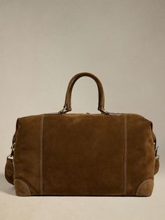 Timeless Brown Travel Bag, Suede Satchel Travel Bag, Suede Satchel With Suede Lining For Travel, Travel Suede Satchel, Classic Satchel With Leather Trim For Overnight Trips, Classic Travel Bag With Palladium Hardware, Luxury Travel Bags With Suede Lining, Suede Travel Bag With Leather Trim, Travel Suede Satchel With Leather Handles