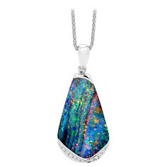 Beguiling and colourful, "Deseo” opal pendant enthrals with its colour-play. This 14.22 carat boulder opal from Winton displays a rare and prized panther pattern. The 18K pure white gold setting and flash of diamonds set off this splendid opal. Un objecto de deseo. Designed by Renata Bernard. The opal gem in this pendant comes from opal mines in Winton, Australia. The pendant is new. PARTICULARS: Size & Stone Measurements: Opal weight: 14.22ct Opal length: 40.78mm Opal width: 17.68mm Opal thickn Boulder Opal Necklace, Boulder Opal Pendant, Opal Pendant Necklace, Australian Boulder Opal, White Gold Set, Solid Gold Chains, Pendant Design, Opal Pendants, Opal Necklace