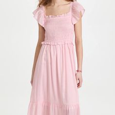 A Charming And Everyday-Friendly Dress From Moon River, Which Features A Pale Shade Of Pink, Smocked Bodice And Frilly Ruffles. Simple Sandals And Sporty Sneakers Both Go Well With This Easy Style. Fabric: Lightweight, Non-Stretch Slubbed Crisp Weave Smocked Elastic Bodice With Flutter Sleeves Ruffle Trim And Hem Shell: 62% Viscose/38% Polyester Unlined Bodice, Lined Skirt Lining: 100% Polyester Hand Wash Pink Smocked Dress With Ruffle Hem For Daywear, Pink Smocked Midi Dress For Daywear, Pink Midi Smocked Daywear Dress, Pink Midi Smocked Dress For Daywear, Pink Smock Midi Dress For Daywear, Red Floral Maxi Dress, Boho Floral Maxi Dress, Cold Shoulder Maxi Dress, Cutout Maxi Dress