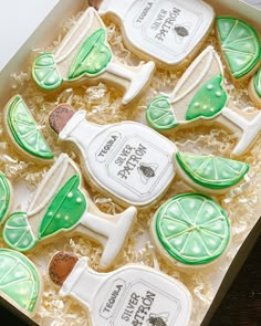 some decorated cookies in a box on a table