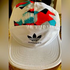 Adidas Skateboarding 5 Panel Hat White Blue Orange Nylon & Plastic Buckle Very Rare Casual White Trucker Hat For Outdoor, Casual Snapback Hat With Curved Brim For Skateboarding, White Urban Snapback Hat For Outdoor, White Baseball Cap For Summer Outdoor Activities, White Snapback Hat For Outdoor Activities, White Breathable Snapback Hat For Outdoor Activities, White Summer Baseball Cap For Outdoor Activities, Casual Curved Brim Snapback Hat For Skateboarding, White Urban Style Snapback Hat For Outdoor