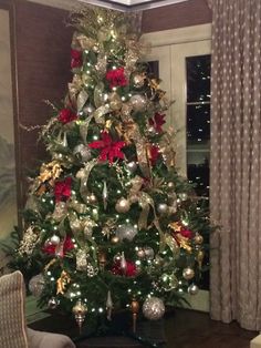 a decorated christmas tree in a living room