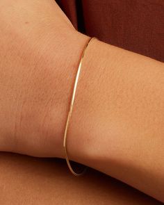 Achieve a timeless look with the 14k Gold Micro Mini Venice Bracelet. This gorgeous solid gold chain bracelet features a classic herringbone chain design that is perfect for any occasion. To wear, stack alongside other gold or beaded bracelets. More is more! Micro Mini Venice Bracelet in 14k Solid Gold, Women's Size 6.5 in. by gorjana Leah Rilke, Gold Herringbone Chain, Earrings Stacking, Bridesmaid Ideas, Solid Gold Bracelet, Orange Agate, Yellow Opal, Herringbone Chain, 14k Gold Necklace