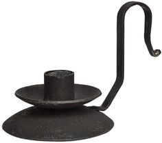 an iron hook with a black hat on it's end and a metal handle