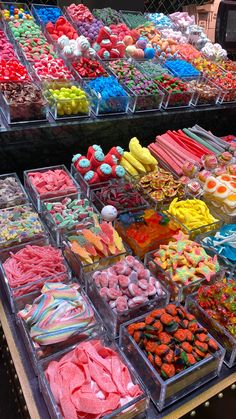 there are many different types of candies on display