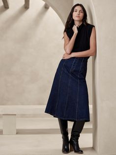 Our newest denim skirt strikes a meticulous balance between rugged and feminine with an irresistible silhouette constructed of rich, rigid denim from Italy.  We added panel seams for added dimension that enhances the sweep of the skirt.  A-line.  Fabric from Italy's Candiani Mill.  Organic: Made with certified, organically grown cotton that's easier on the earth.  Button fly.  Belt loops.  Unlined.  A-line.  Midi length.  Model: Size 2, 5'10" (178cm). Fall Jackets Outfit, Summer Wardrobe Staples, Midi Denim, Trendy Denim, Denim Midi Skirt, Skirts Online, Bottom Clothes, Women Skirts Midi, Outfits Casuales