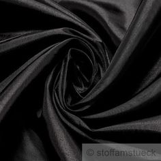 the black fabric is very soft and shiny