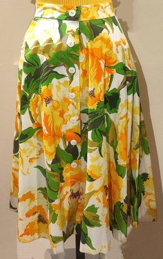 A vintage 70s tailored skirt. Produced with Falconetto cotton fabric with yellow, orange and green flowers on a white base. Measurements: waist cm 38, length cm 78. Size S. Very good condition. Sterilized and washed. Retro Floral Print Summer Skirt, Retro Floral Print Skirt For Summer, Retro Green Skirt For Summer, Green Retro Skirt For Summer, Yellow Floral Cotton Skirt, Vintage Yellow Lined Skirt, Vintage Green Skirt For Spring, Vintage Green Summer Skirt, Vintage Green Skirt For Summer