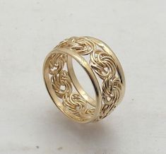 Size 8 Technibond Framed Rosette Link Band Ring 14K Yellow Gold Plated Silver Metal Product ID Condition Finish Weight Width Size Retail Price Real Sterling Silver (Stamped 925) TR3-167 Brand New Polished 4.30 grams 10.00mm ~ 3/8" 8 $129.95 You'll reach for this handcrafted ring over and over.   Framed rosette link ring. Top-Notch Quality! Art Carved Wedding Bands, Link Ring, Art Carved, Linking Rings, Handcrafted Rings, Gold Plated Silver, Band Ring, Wedding Band, Band Rings