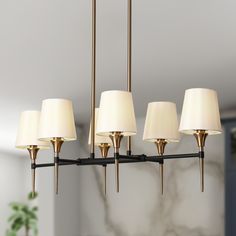 The 6-Light white fabric chandelier by Uolfin Lighting walks into your warm home, and its modern design perfectly fits with it. The geometric chandelier passing through the cloth cover appears softer and warmer. The arrival of this modern brass gold chandelier not only illuminates the room but also becomes a beautiful decoration. This kind of transitional chandelier symbolizes the good taste of the homeowner, creating every corner of the home with heart and paying attention to the details of lif Black And Brass Chandelier, Fabric Chandelier, Transitional Chandeliers, Warm Home, Geometric Chandelier, Art Deco Chandelier, Contemporary Chandelier, Gold Chandelier, Dining Room Chandelier