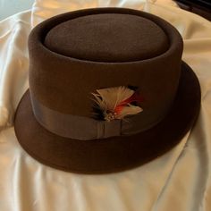 Fedora Hat Size Small For Men Or Women Brown Felt Hat With Flat Bill For Formal Occasions, Classic Brown Top Hat For Kentucky Derby, Formal Brown Felt Hat With Flat Bill, Classic Brown Top Hat For Winter, Brown Boater Hat With Short Brim For Winter, Classic Brown Boater Hat With Flat Brim, Classic Brown Wool Top Hat, Brown Felt Flat Bill Hat For Kentucky Derby, Brown Flat Bill Felt Hat For Kentucky Derby