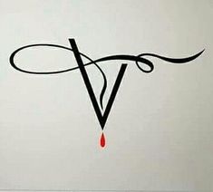 the letter v is dripping blood on a white wall