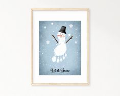 a snowman wearing a top hat and scarf