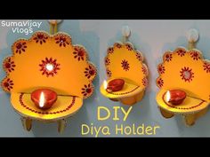 three diya holders with candles on them and the words diy diya holder