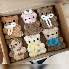 a box filled with lots of small stuffed animals