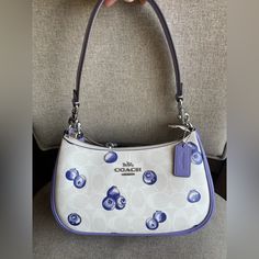 ***Come With Gift Receipt*** Coach Teri Shoulder Bag In Signature Canvas With Blueberry Print Coach Cr292 | Signature Coated Canvas And Smooth Leather | Two Credit Card Slots | Inside Multifunction Pocket | Zip-Top Closure, Fabric Lining | Detachable Handle With 8 1/4" Drop | Detachable Strap With 22 3/4" Drop For Shoulder Or Crossbody Wear | 9 1/2" (L) X 6" (H) X 3" (W)|Style No. Cr292| Coach Teri Shoulder Bag, Blueberry Print, Coach Nolita, Carryall Tote, Nike Tennis Dress, Signature Canvas, School Fits, Walker Boots, Shoulder Tote Bag