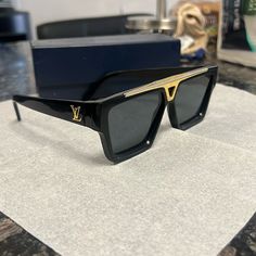 A Solid Unisex Louis Vuitton Sunglasses. Can Be Worn As An Accessory To Any Outfit. Black Louis Vuitton, Louis Vuitton Sunglasses, Louis Vuitton Accessories, Unisex Sunglasses, Solid Black, Louis Vuitton, Women Accessories, Fashion Outfits, Sunglasses