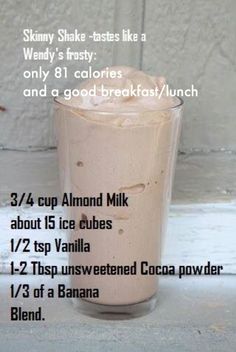 a tall glass filled with chocolate milkshake next to a white wall and text that reads skinnyy shake tastes like a wendy's frosty 8 calories only 81 calories and a good breakfast /