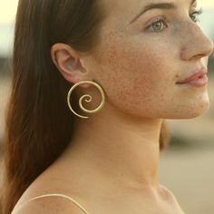 Swirl Statement Earrings Gold, Big Gold Occasion Earrings, Gold Spiral Earrings, 14K Gold Vermeil Statement Swirls * Captivating Swirl * Symbol of the Divine Feminine * Also Avaliable in Medium size * 14K Gold Gold Vermeil (2.5 Microns) * High quality Sterling Silver Base * Lead & Nickel free * Small Batch Jewellery created with love A captivating textural swirl motif that effortlessly exudes movement and fluidity and captures attention. The Swirl is a symbol of the divine feminine as well as li Spiral Hypoallergenic Hoop Earrings, Swirl Symbol, Printed Canvas Bag, Studs Gold, Gold Statement Earrings, Spiral Earrings, Hypoallergenic Jewelry, Divine Feminine, Gold Gold