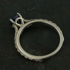 "Lapis Lazuli Ring Full Cut Lapis Ring Blue Engagement Ring Antique Style Ring Sterling Silver Alternative Engagement Ring Blue Jeans Looking for your bride's \"something blue\"? Look no further than our Lapis Lazuli solitaire \"Blue Jeans\" ring. This traditional setting is modernized with a full cut 6mm Lapis Lazuli stone. Its name comes from the Latin lapis, \"stone,\" and the Persian lazhuward, \"blue.\" It is said to help bring inner peace and clear one's mind from negative thought patterns Engagement Ring Blue, Engagement Ring Antique, Antique Style Rings, Lapis Stone, Blue Engagement Ring, Thought Patterns, Alternative Engagement Ring, Lapis Ring, Lapis Lazuli Ring