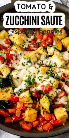 a skillet filled with zucchini sauce and vegetables