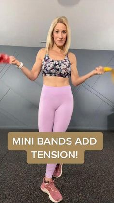 a woman in pink leggings and a bra top with the words mini bands add tension