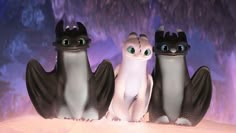 three toothless bats are standing next to each other in front of a purple background