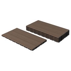 three pieces of wood sitting next to each other on top of a white flooring board