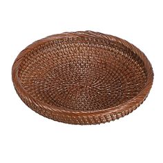 a brown woven basket on a white background