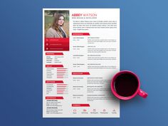 a red and white resume with a cup of coffee