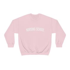 Great for any Nursing student, alumni, teacher, or aspiring scholar! Our unisex heavy blend crew neck sweatshirt is the perfect combination of comfort and style.     50% cotton + 50% polyester (fiber content may vary for different colors)  Medium heavy fabric With no side seams, there are no itchy interruptions under the arms Shoulders are taped for improved durability Ribbed knit collar  Classic unisex fit and runs true to size  Tear away label  Printed in the USA School Series, Nursing Student, Printing Labels, Nursing Students, Nursing School, Sweat Shirt, Favorite Outfit, Ribbed Knit, Gender Neutral