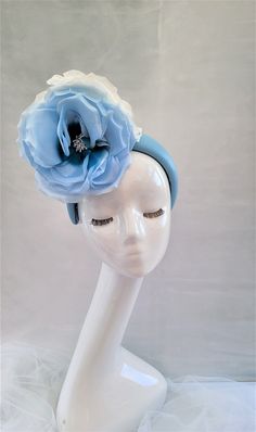 "Express Shipping Please note if  you need your item urgently we can sometimes offer express dispatch and shipping, but do get in touch with us first before purchasing to make sure we are able to meet your time scale. Presenting a beautiful baby blue leather covered headband, which is 7 cms in width at the widest part approximately.  It is decorated with ivory and blue silk flowers and attaches with a millinery elastic which fits under your hair. Absolutely stunning and unique.   Please note tha Leather Headband, Ascot Hats, Flower Fascinator, Leather Headbands, Wedding Fascinators, Wedding Headpiece, Elegant Accessories, Blue Silk, Color Swatches