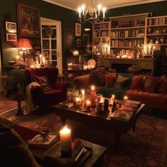 a living room filled with lots of furniture and candles