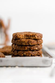 a stack of cookies sitting on top of a metal tray