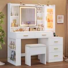 a white vanity with lighted mirror, stool and lights on the top shelf next to it