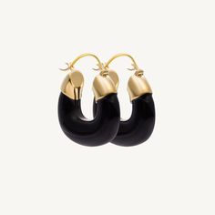 Black onyx and 14k yellow gold earring. Total weight: 4.86g Luxury Black Onyx Earrings, Luxury Black Earrings With Polished Finish, Black 14k Gold Earrings For Evening, Luxury Gold Onyx Earrings, Luxury Onyx Drop Earrings, Classic Black Hoop Earrings For Formal Occasions, Classic Black Single Earring, Single Black Luxury Earring, Luxury Black Single Earring