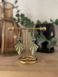 These new earrings are made in a unique model. They are made up of a brass element decorated by me and blue and green colored boho beads. The hooks are gold plated, so there is no risk in giving them away! Can be worn every day, they will also be perfect for an evening. You can also find all of Origine Bijoux on Etsy, Facebook and Instagram. Dangle Beaded Brass Earrings For Gifts, Beaded Dangle Brass Earrings For Gifts, Gift Brass Beaded Dangle Earrings, Beaded Dangle Earrings In Brass As A Gift, Blue Metal Beaded Earrings For Gift, Adjustable Gold-plated Earrings For Parties, Handmade Green Hoop Earrings For Gift, Beaded 14k Gold Filled Earrings For Gift, Adjustable Gold Plated Earrings For Party