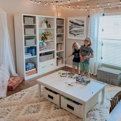 Carolina Grow with You Activity Carts | Pottery Barn Kids Pottery Barn Playroom, Extra Wide Dresser, Paneled Doors, Wall Storage Systems, Kids Play Table, Playroom Rug, Wide Dresser, Study Furniture, Playroom Storage