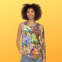 -Pop art Unisex Tank Top  -original outsider cartoon art tank -colorful funky gift for art lovers  -comic and whimsical print tank top  -artsy gift idea This detailed original pop cartoon art work was created by my teenage son Jack! Jack recently graduated from High School and will be majoring in Art Animation. Jack was voted "Most Artistic Male" by his senior class and loves to draw or doodle on everything he gets his hands on. Jack is incredibly intelligent, Artistic and knows more about music than anyone I know! He's an amazing young man who is well liked by everyone who knows him and especially loved by his family! Thank you for supporting Jack! Check out my shop  etsy.com/shop/LuluandSamCo   Made with 100% polyester, this unisex tank top keeps things laidback and breezy thanks to its Fun Multicolor Tops With Graffiti Print, Fun Multicolor Graffiti Print Tops, Playful Multicolor Tank Top, Retro Multicolor Tank Top, Retro Racerback Tank Top With Graphic Print, Playful Graphic Print Tank Top For Summer, Fun Multicolor Tops With Custom Print, Playful Multicolor Sleeveless Tank Top, Fun Cotton Tank Top With Graphic Print