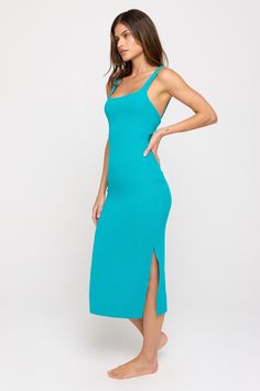 Look back at it. A fitted, mid-length dress. Designed with an interior bra, flattering rounded square neckline, and twist-back design. Made in our light and fluid signature Slim Rib fabric, which offers maximum flexibility, softness, and breathability with compressive support. | Valerie Twist Back Midi Dress in Surf Chic Square Neck Midi Dress With Ruched Back, Stretch Midi Dress With Cutout Back, Square Neck Stretch Bodycon Dress For Brunch, Stretch Square Neck Bodycon Dress For Brunch, Fitted Midi Dress With Cutout Back, Chic Scoop Neck Seamless Dresses, Chic Seamless Scoop Neck Dresses, Spring Date Night Seamless Dress, Chic Stretch Midi Dress With Scoop Neck