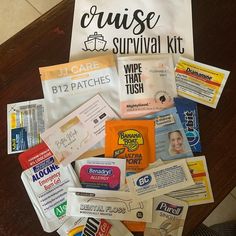 the contents of a travel kit laid out on top of a wooden table next to a white bag